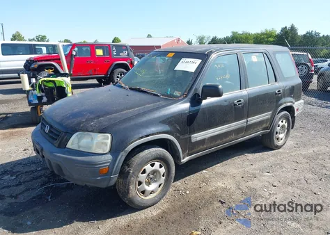 1999 Honda Cr-V Lx z USA, uszkodzony, nr VIN JHLRD2842XC010409